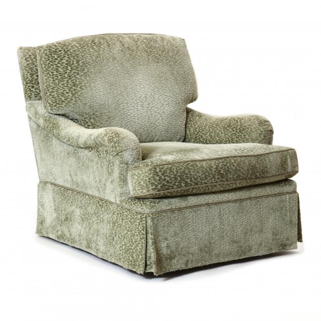 AN UPHOLSTERED CLUB CHAIR 20th 2efa5d