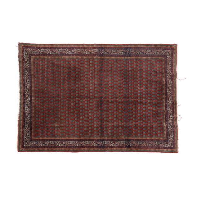 PERSIAN RUG With rusty red field