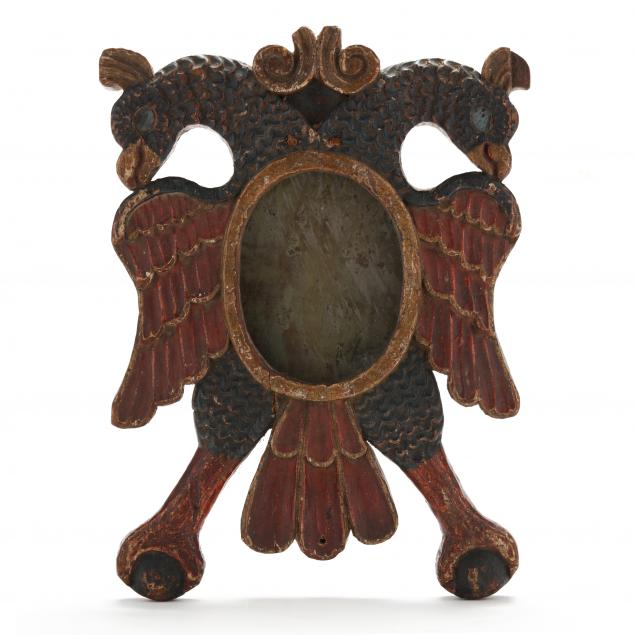 A SPANISH COLONIAL CARVED DOUBLE