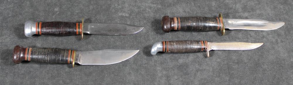 FOUR COLLECTABLE MARBLES FIXED BLADE