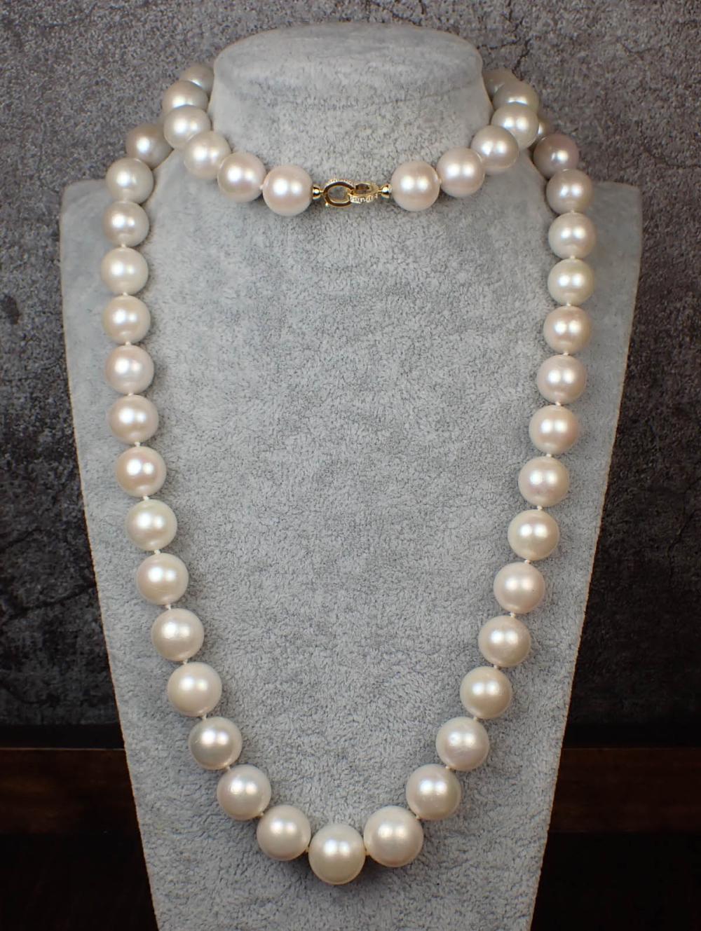 SOUTH SEA PEARL AND EIGHTEEN KARAT