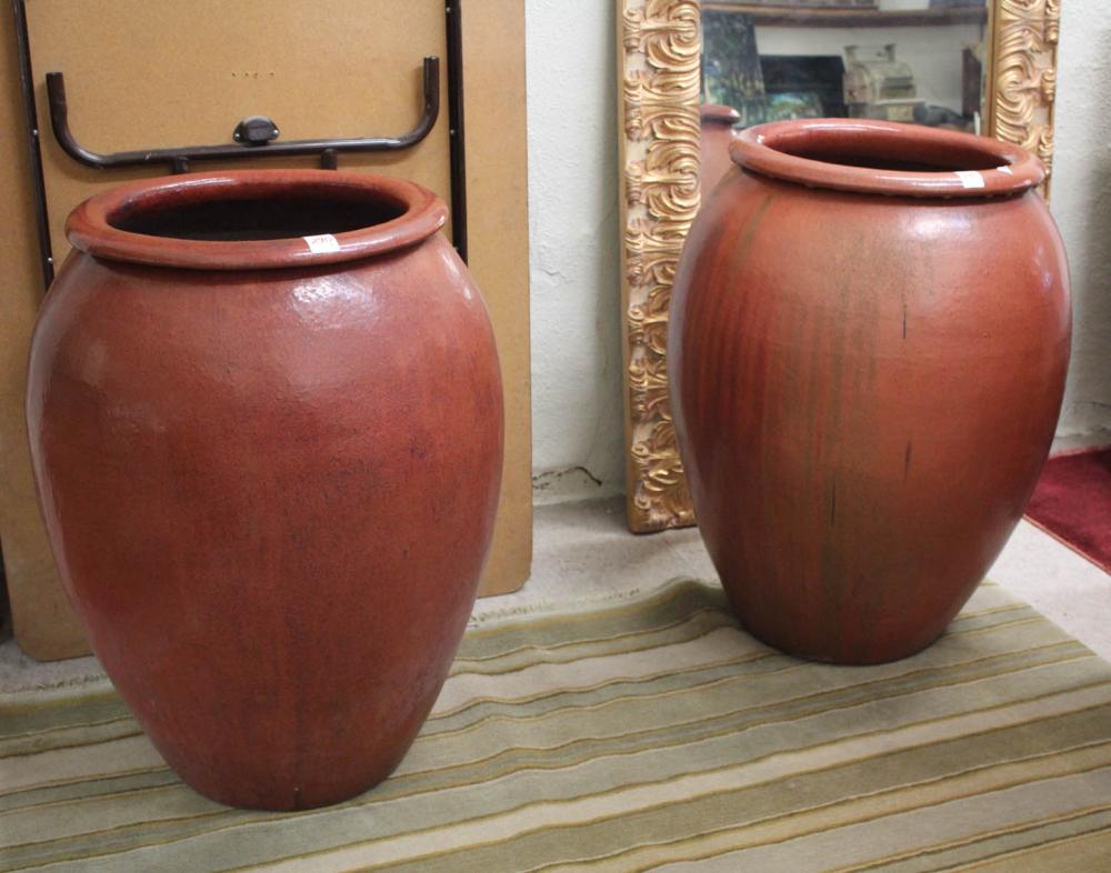 LARGE PAIR OF RED GLAZED POTTERY