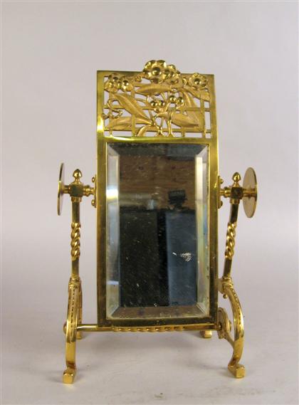 Art Nouveau style brass mirror