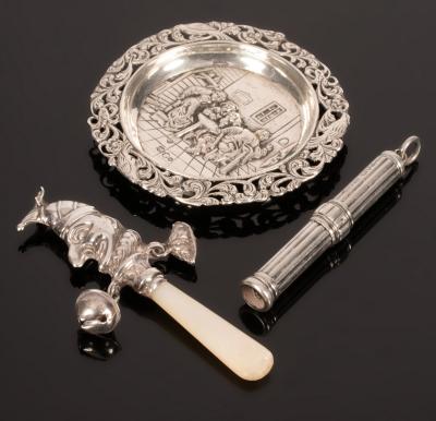 A small silver novelty rattle modelled