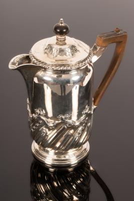 A late Victorian silver hot water