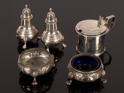 A pair of silver pepper pots, G & S