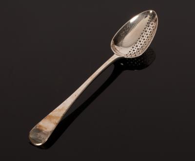 A George III silver strainer spoon,
