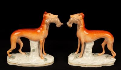 A pair of Staffordshire dogs with quarry,