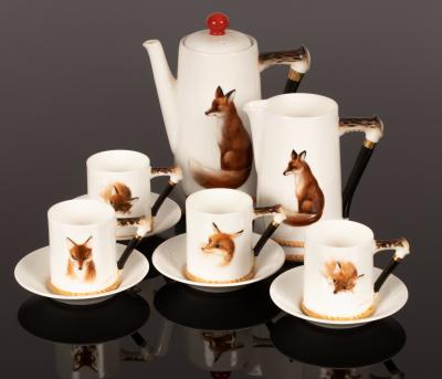 A Royal Doulton coffee set, each