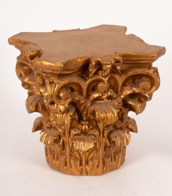 A decorative gilt Corinthian capital