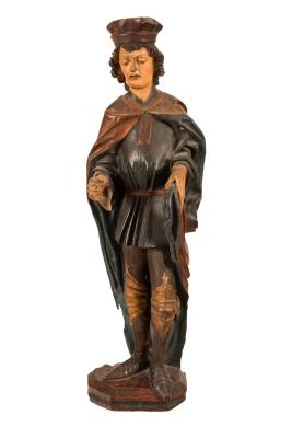 A carved and painted figure of St Martin,