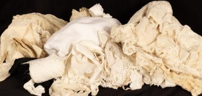 A quantity of lace and textiles, to