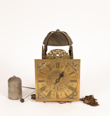 An 18th Century striking lantern clock,