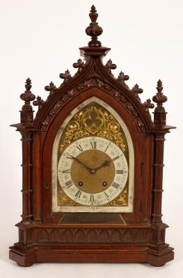 A Victorian oak cased mantel clock