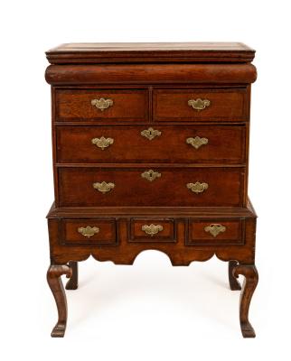 A George II burr elm chest on stand