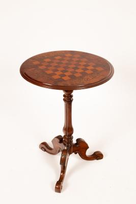 A Victorian walnut table the top