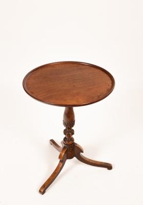 A 19th Century mahogany table on tripod