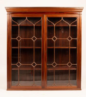 A mahogany bookcase with moulded 2ee3bd