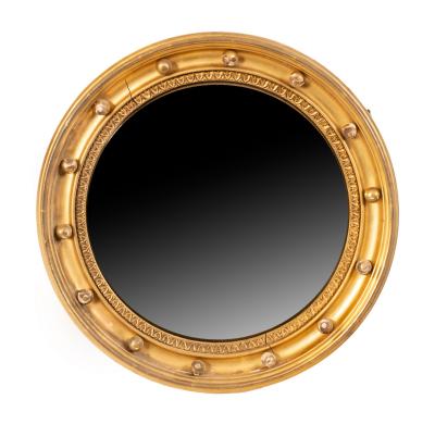 A gilt framed convex mirror in 2ee3c1