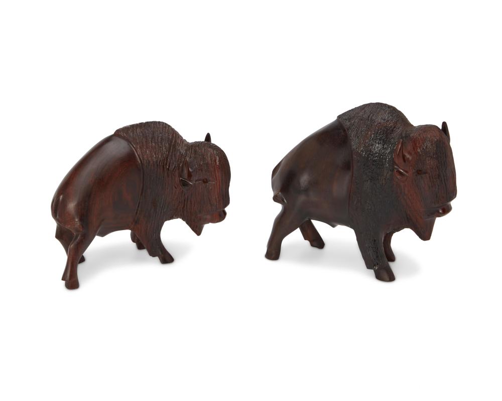 TWO IRONWOOD CARVED BISON FIGURESTwo