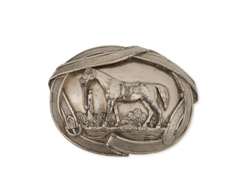 A LARGE SILVER-PLATED HORSE BELT BUCKLEA