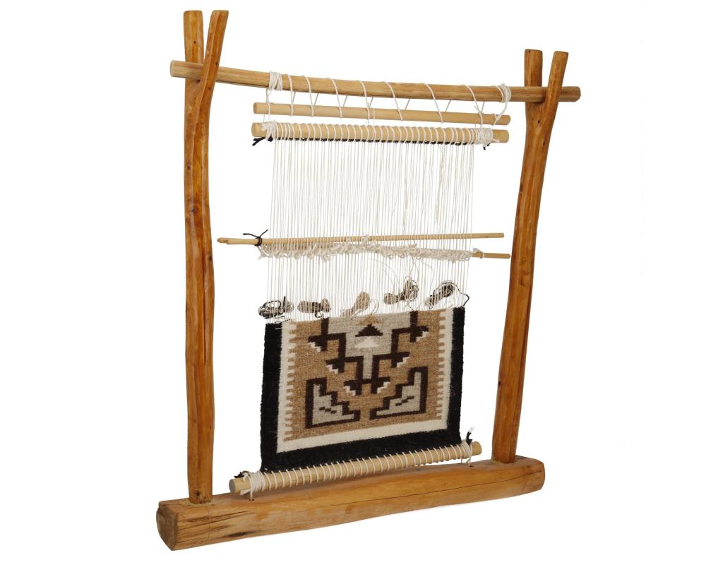 A LOOM WITH A NAVAJO TWO GREY HILLS