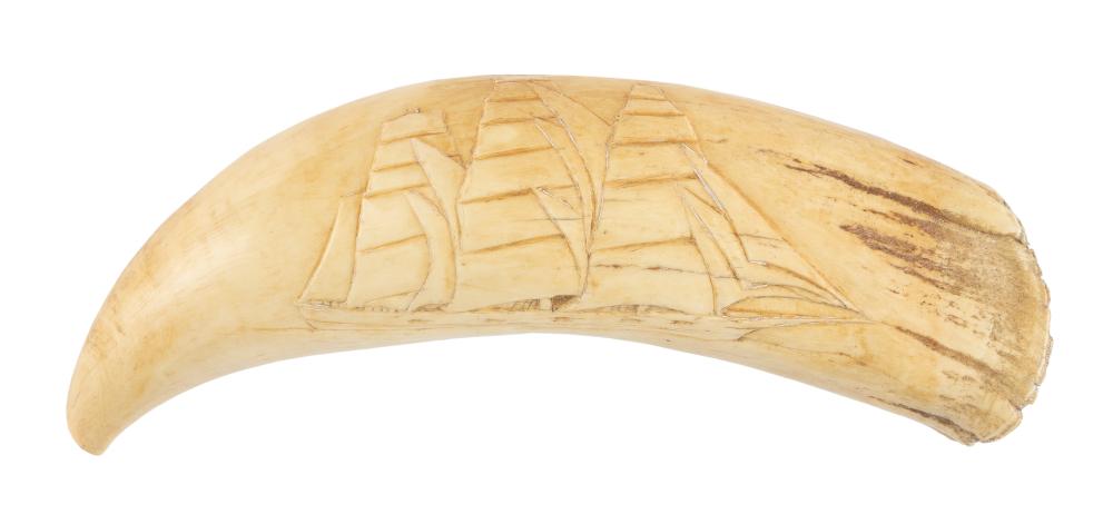 * RELIEF-CARVED WHALE'S TOOTH WITH
