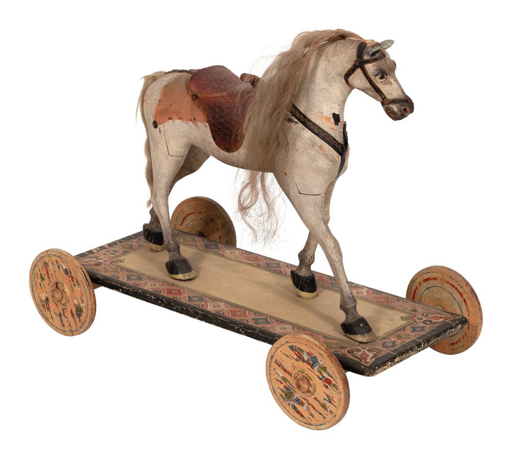 CHILD'S CARVED WOODEN HORSE ON