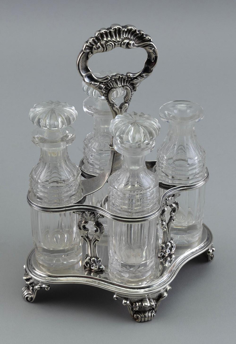 FOUR-BOTTLE SILVER CRUET SET LONDON,