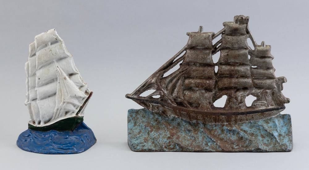 TWO CAST IRON CLIPPER SHIP DOORSTOPS