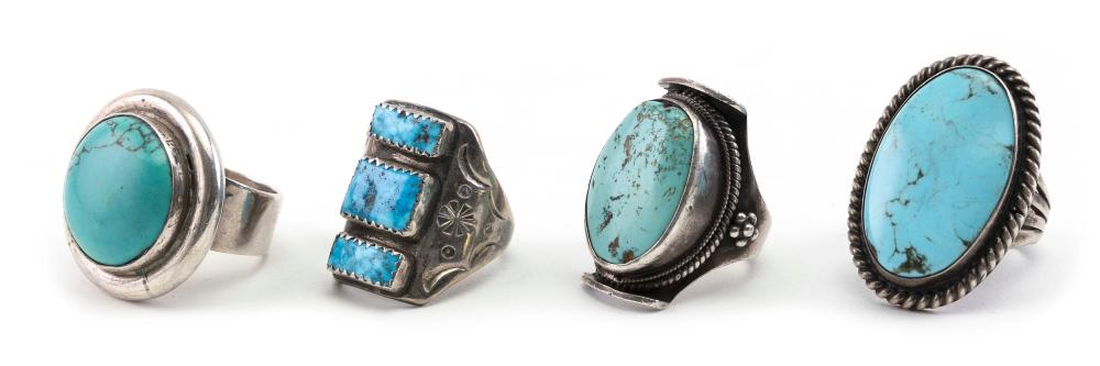 FOUR SILVER AND TURQUOISE RINGS  2f1d91