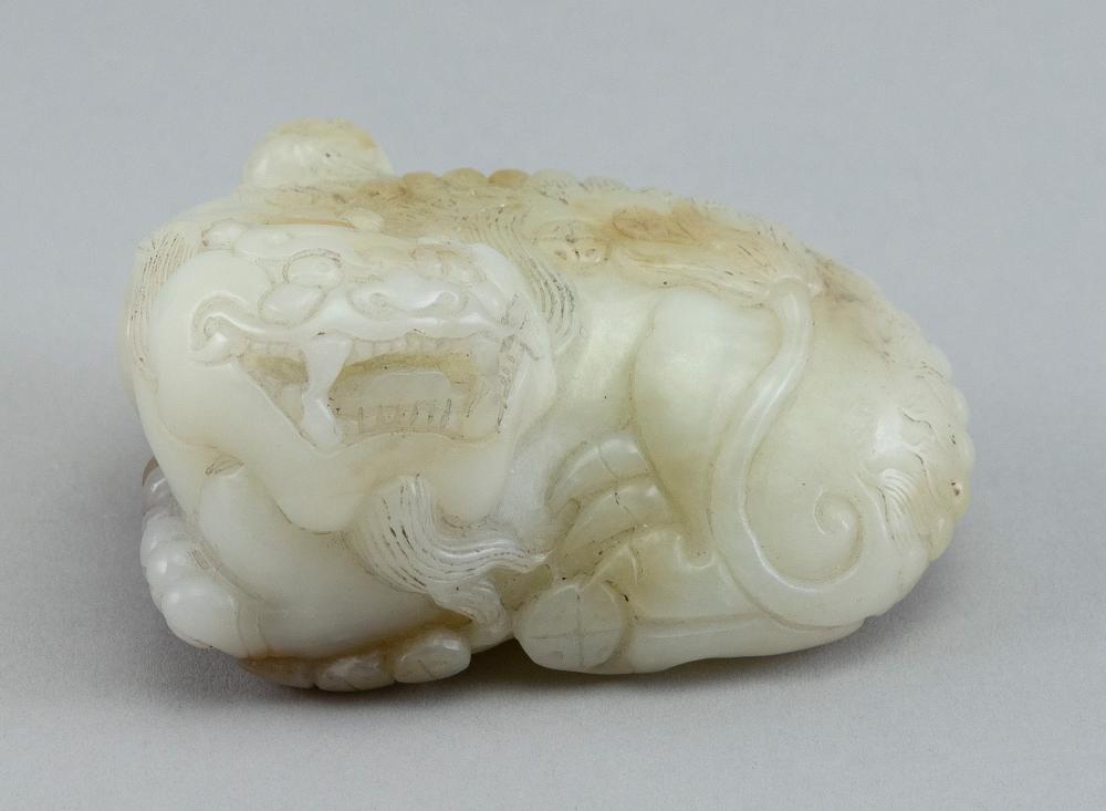 CHINESE CARVED WHITE JADE RECUMBENT 2f1fb2