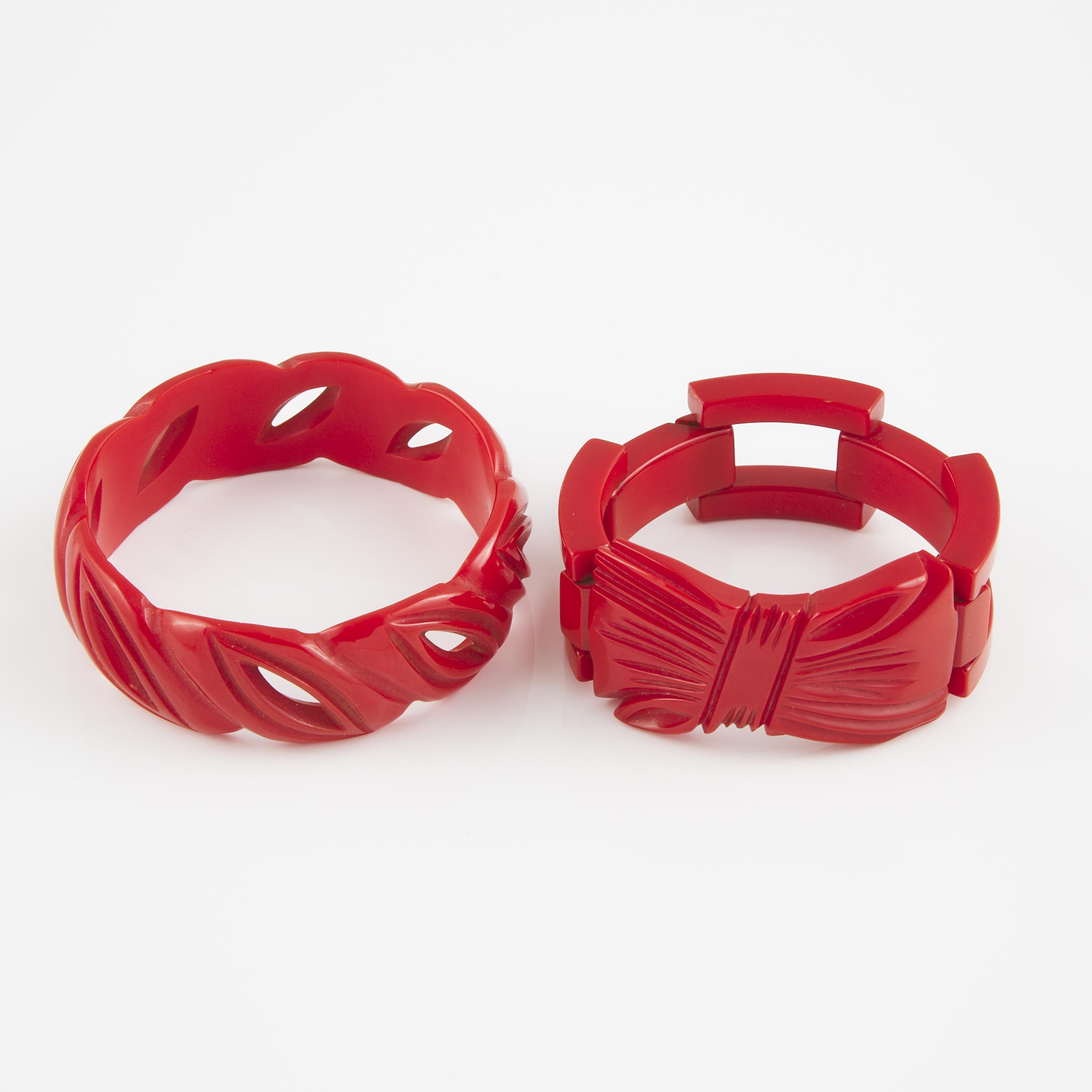 2 Carved Red Bakelite Bracelets 2f20a7