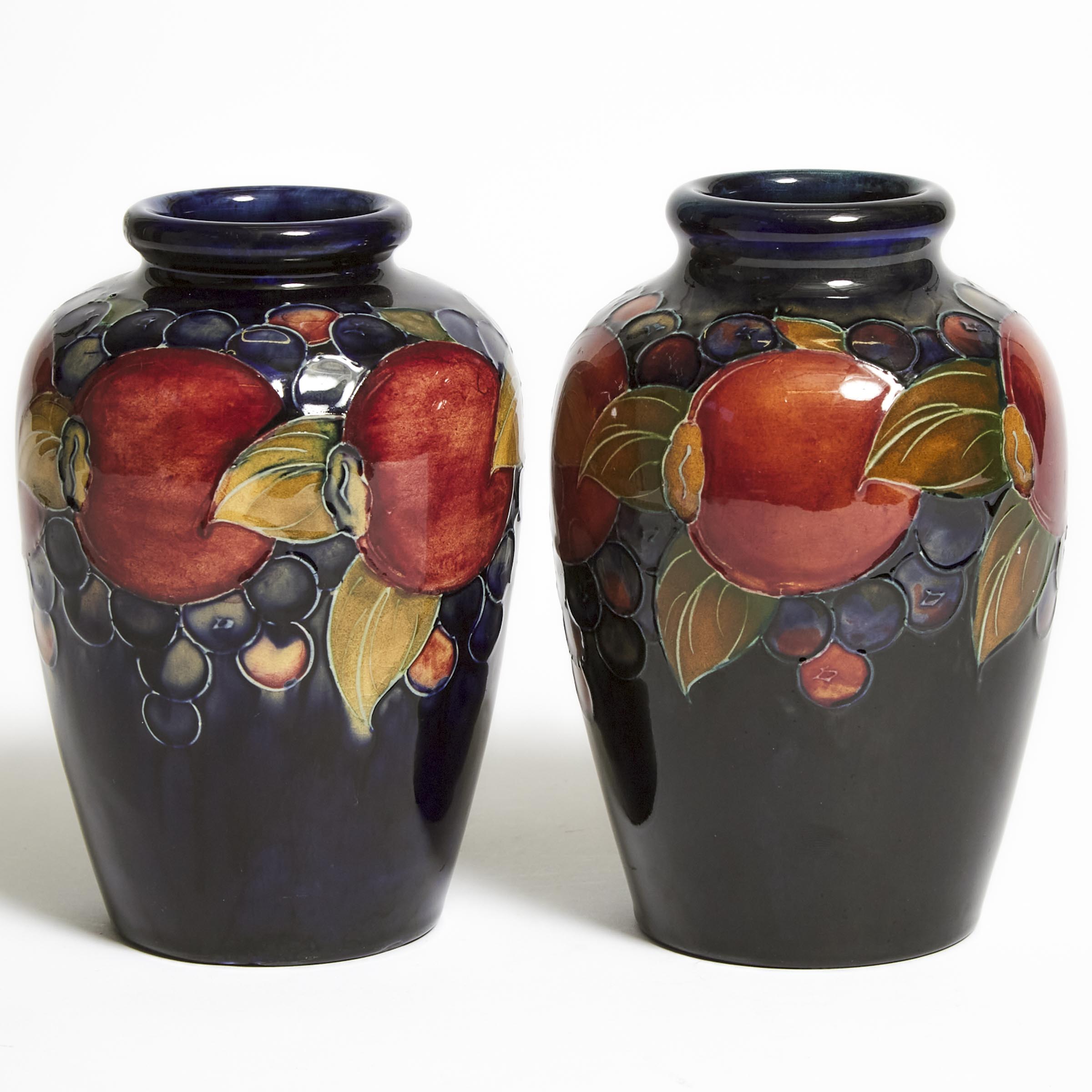 Pair of Moorcroft Pomegranate Vases,