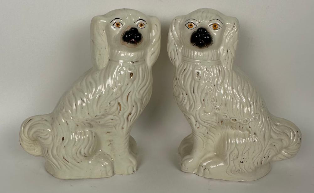 PAIR OF WHITE STAFFORDSHIRE SPANIELS 2f241a