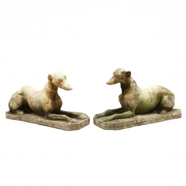 PAIR OF CAST STONE RECUMBENT HOUNDS 2f0631