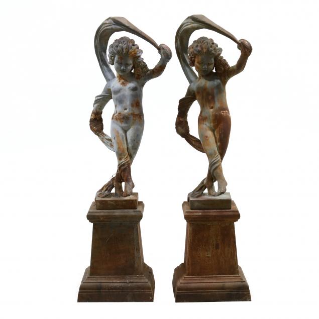 PAIR OF CAST IRON GARDEN STATUES 2f062b