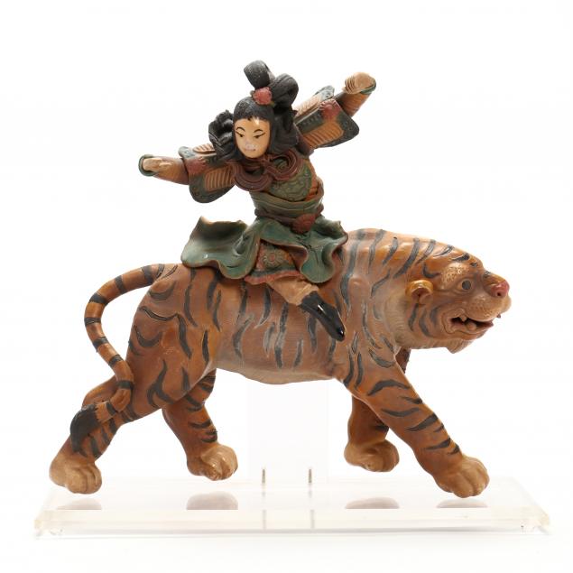 A CHINESE TIGER WITH RIDER POTTERY 2f073a