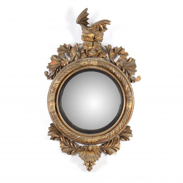 CONTINENTAL CARVED AND GILT CONVEX