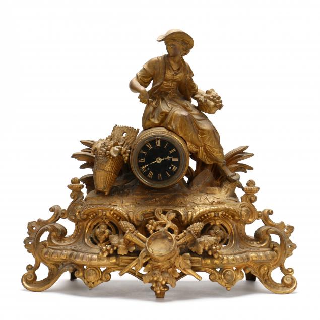 GILT METAL MANTEL CLOCK CELEBRATING