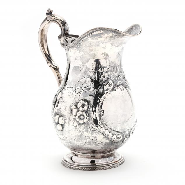 AN AMERICAN COIN SILVER PITCHER,