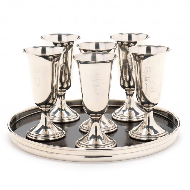 A SET OF SIX STERLING SILVER CORDIALS
