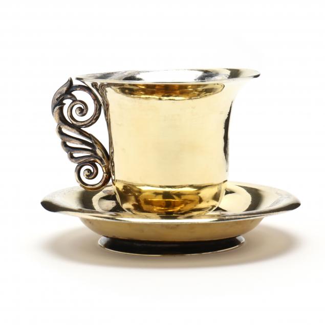 A CONTINENTAL SILVER CUP AND SAUCER 2f0c44