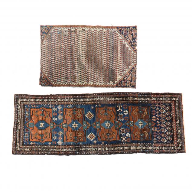 TWO PERSIAN RUGS The first with