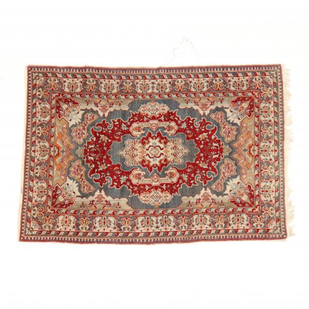 HANDWOVEN WOOL RUG The barbed red