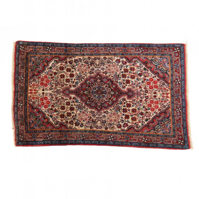 KASHAN AREA RUG The center poled