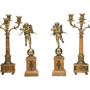 A Pair of Brass and Marble Cherub