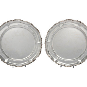 A Pair of Mexican Silver Trays
Juventino