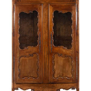 A French Provincial Walnut Armoire
Early