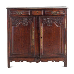 A French Provincial Oak Cabinet
Late